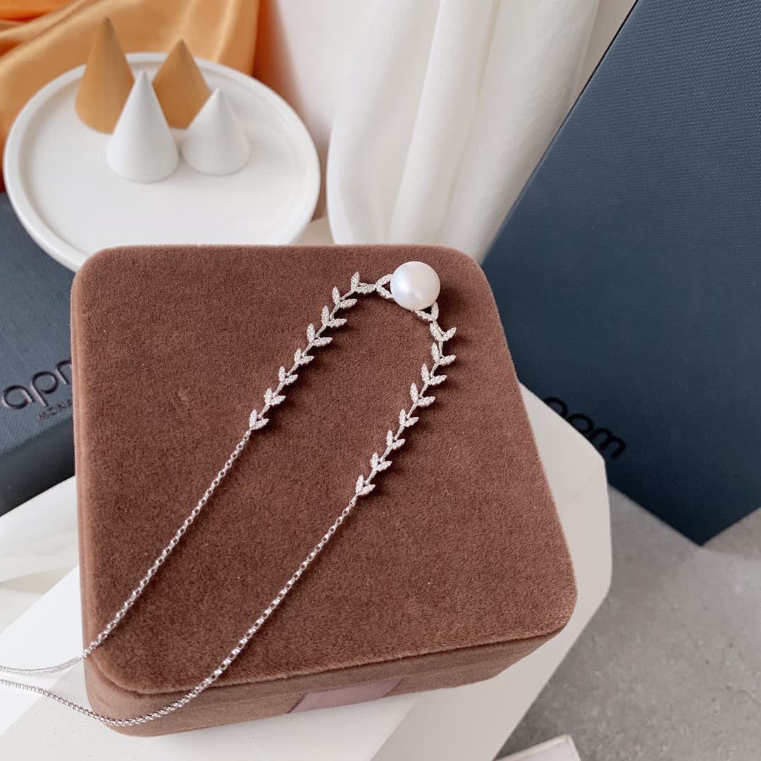 APM Monaco Pearl and Diamond Leaf Necklace